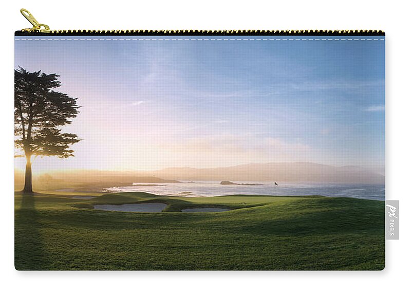 Photography Zip Pouch featuring the photograph 18th Hole With Iconic Cypress Tree by Panoramic Images
