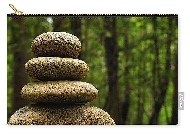 Concepts & Topics Zip Pouch featuring the photograph Balance #1 by Ianchrisgraham