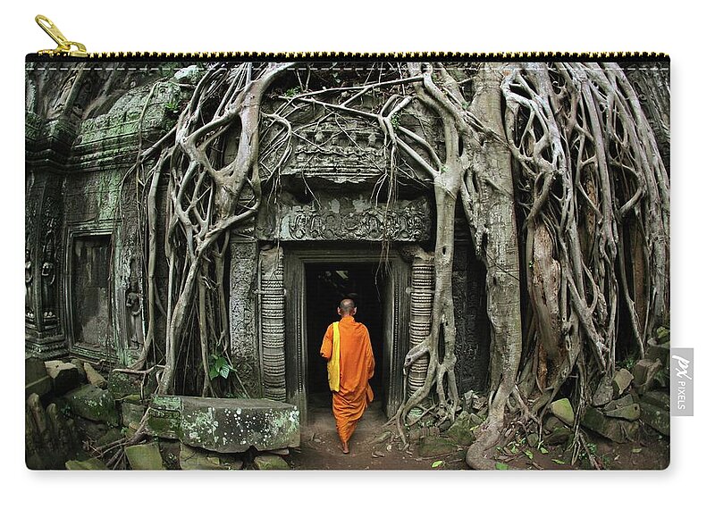 Orange Color Zip Pouch featuring the photograph Buddhist Monk At Angkor Wat Temple #1 by Timothy Allen