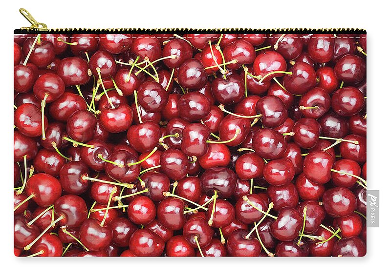 Cherry Zip Pouch featuring the photograph Cherries #1 by Maria Toutoudaki
