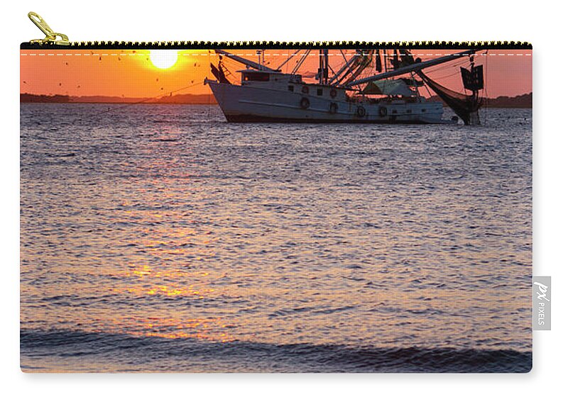 Water's Edge Zip Pouch featuring the photograph Fishing Boat At Sunset #1 by Tshortell