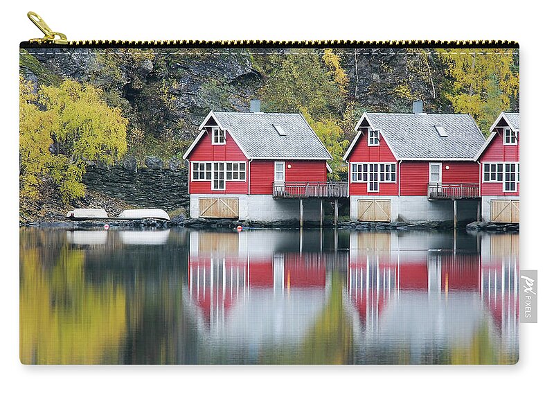Built Structure Zip Pouch featuring the photograph Fishing Huts #1 by Alexandrumagurean