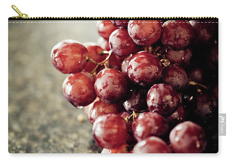 Purple Zip Pouch featuring the photograph Grape #1 by Mmeemil