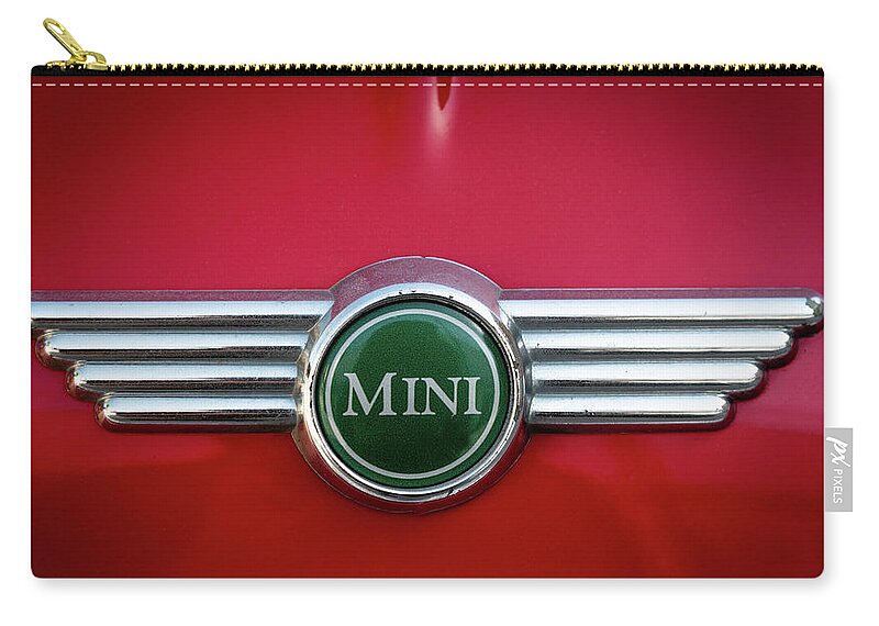 Mini Zip Pouch featuring the photograph Mini Cooper car logo on red surface #2 by Michalakis Ppalis