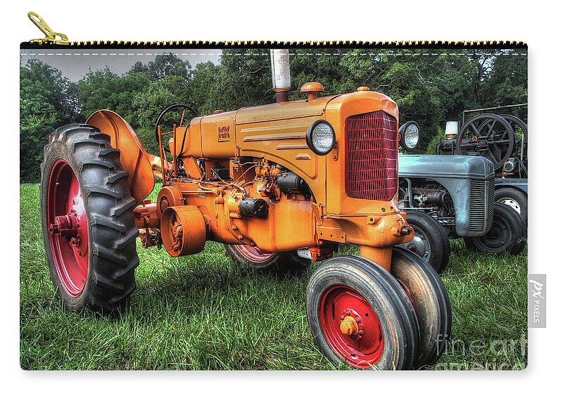 Tractor Zip Pouch featuring the photograph Minneapolis-Moline #1 by Mike Eingle