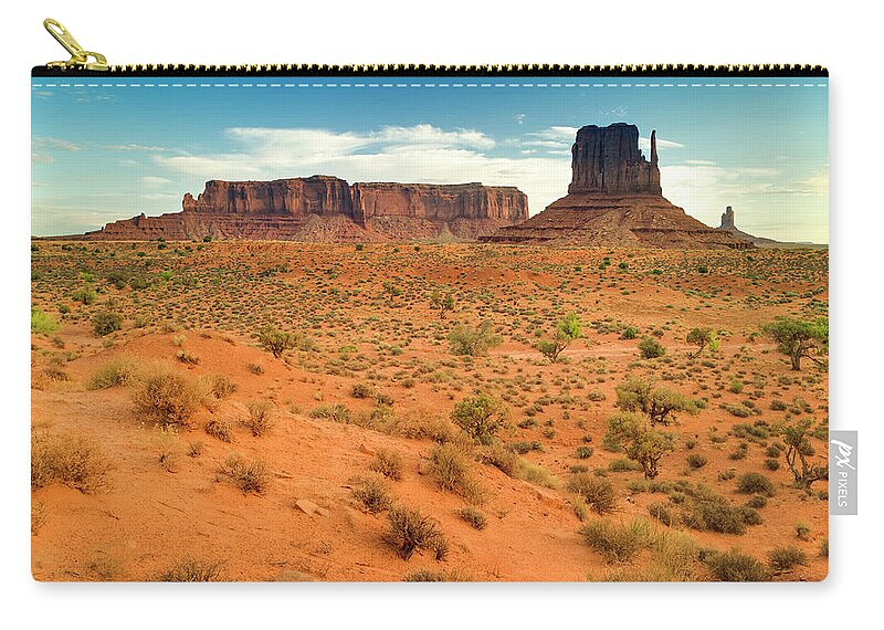 Dust Zip Pouch featuring the photograph Monument Valley Tribal Park #1 by Pgiam