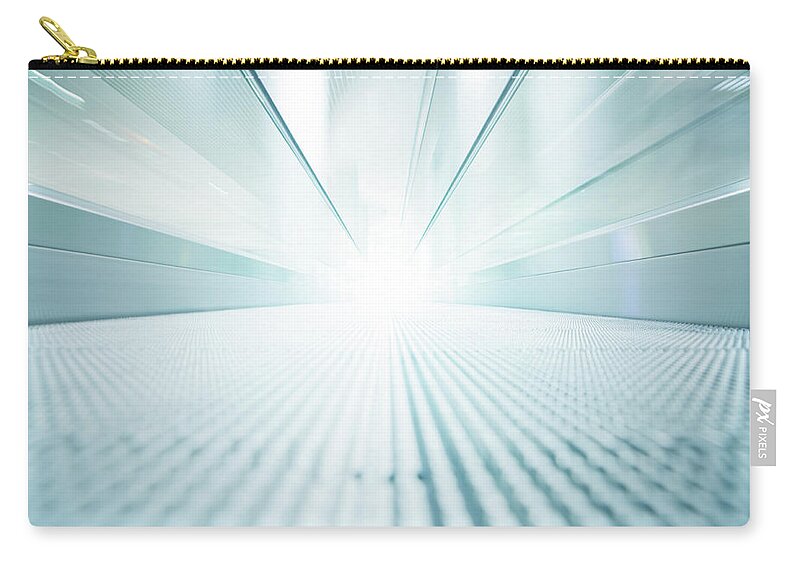 Motion Zip Pouch featuring the photograph Motion To The Light #1 by Tunart