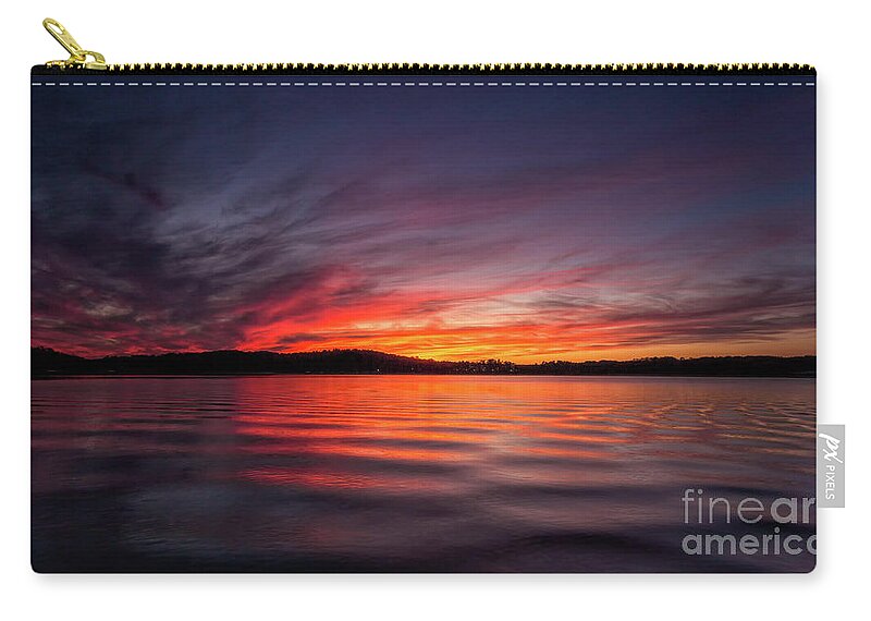 Lake-lanier Zip Pouch featuring the photograph Sunrise on the lake #1 by Bernd Laeschke