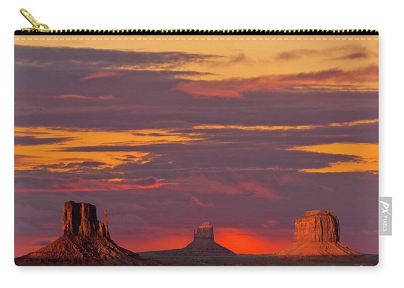 Arid Climate Carry-all Pouch featuring the photograph The Mittens and Merrick Butte at Sunset by Jeff Goulden