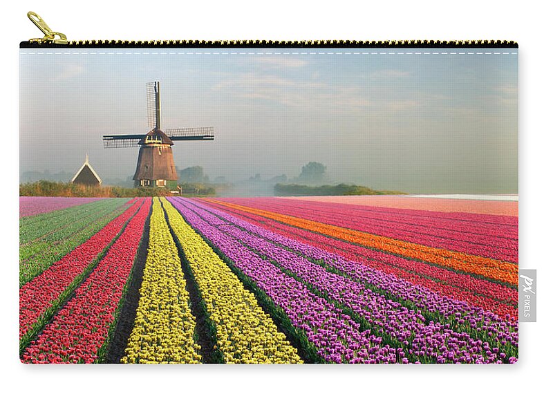 Orange Color Zip Pouch featuring the photograph Tulips And Windmill #1 by Jacobh