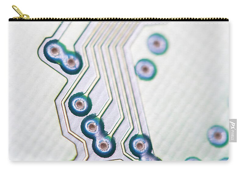Electrical Component Carry-all Pouch featuring the photograph Close-up Of A Circuit Board by Nicholas Rigg