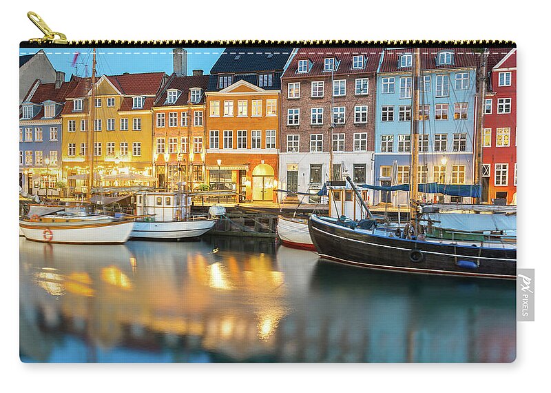 Orange Color Zip Pouch featuring the photograph Nyhavn, Copenhagen, Denmark by Chrishepburn