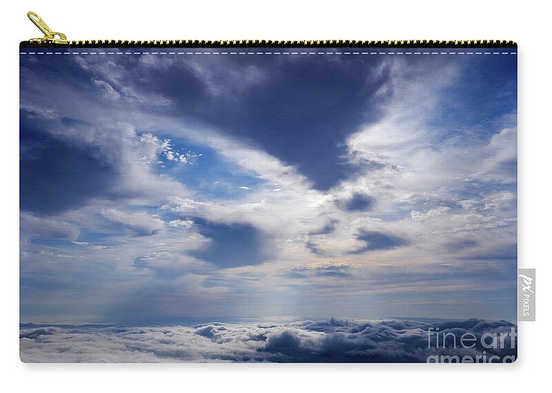 Alps Zip Pouch featuring the photograph Scene of a winter cloudy sky from the top of a mountain peak. #3 by Joaquin Corbalan