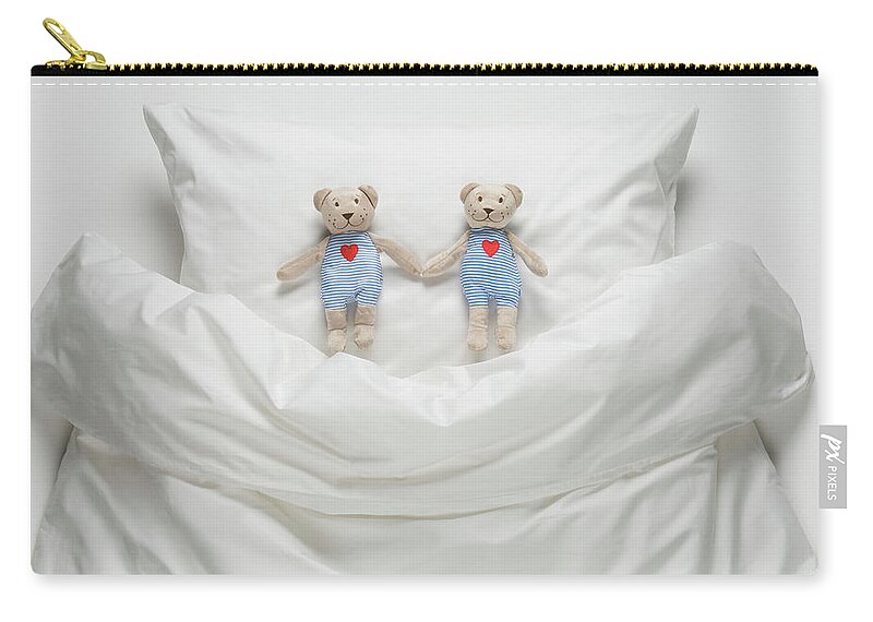 Two Objects Zip Pouch featuring the photograph Teddy Bear On Bed #2 by Westend61