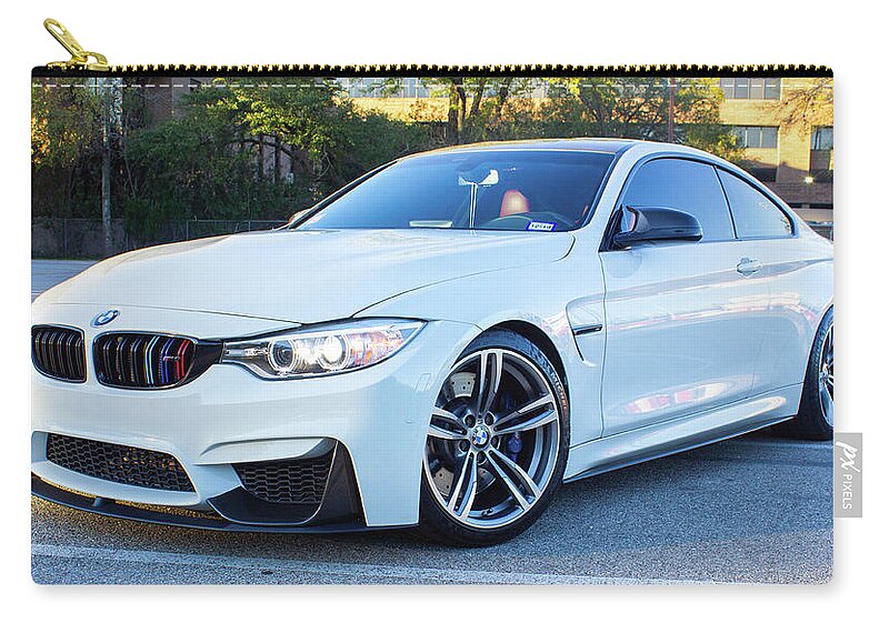 Bmw M4 Zip Pouch featuring the photograph Bmw M4 by Rocco Silvestri