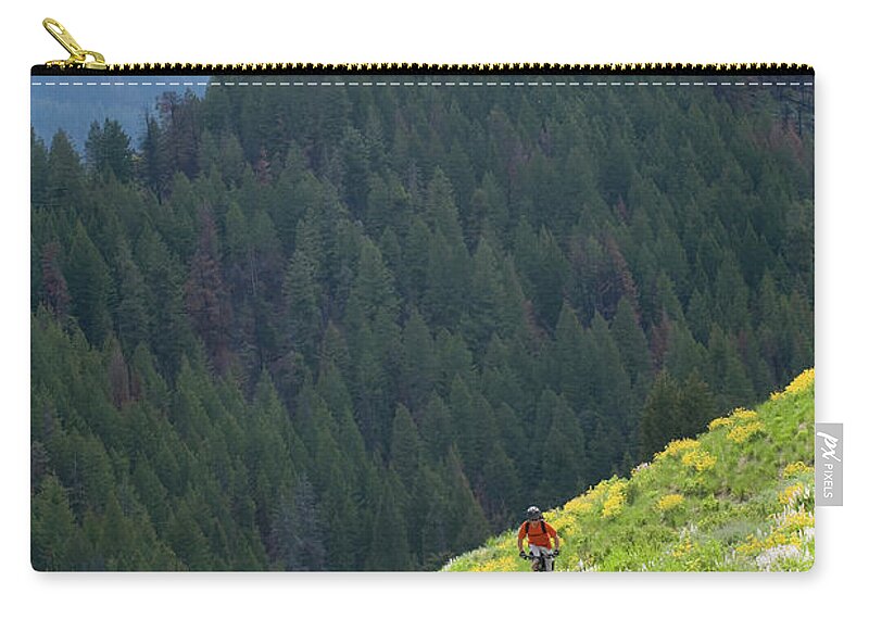 Young Men Zip Pouch featuring the photograph Man Mountain Biking In Sun Valley #3 by Scott Markewitz