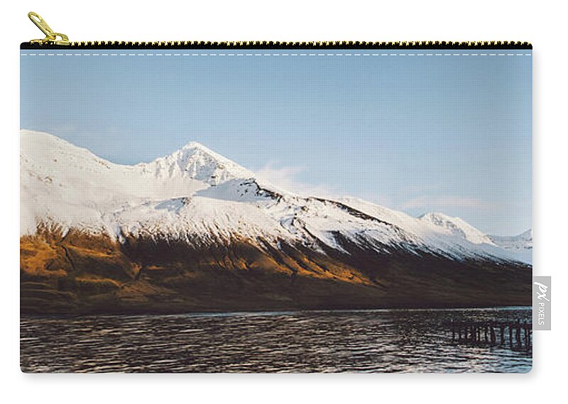 Adventure Zip Pouch featuring the photograph Beautiful scene of a landscape with high snowy mountains and sea. #4 by Joaquin Corbalan