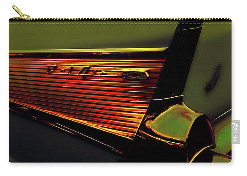 Chevy Zip Pouch featuring the photograph 57 Chevy Bel-Air - Lines of an Icon by Carl H Payne