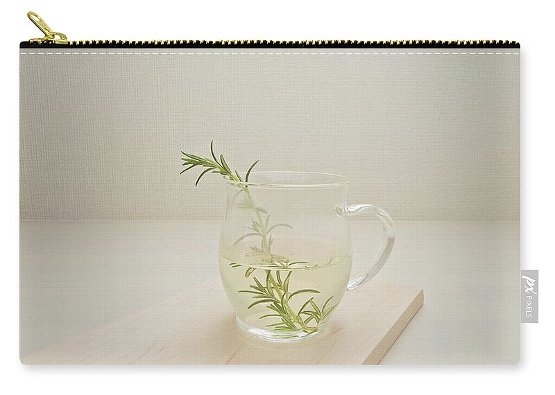 Cutting Board Zip Pouch featuring the photograph A Cup Of Rosemary Tea by Margarita Komine