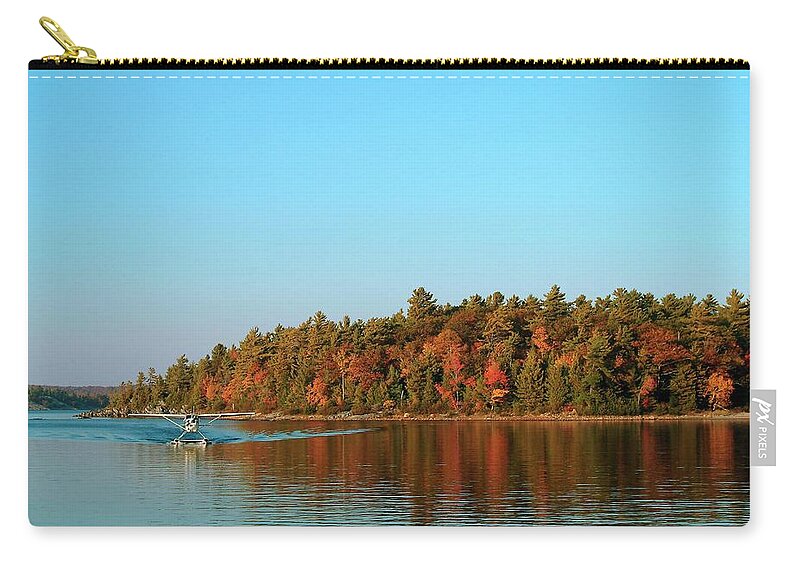 Scenics Zip Pouch featuring the photograph A Float Plane On A Lake by Design Pics/design Pics Bro