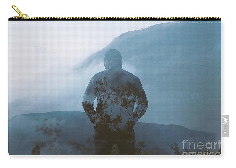 Three Quarter Length Zip Pouch featuring the photograph A Man On The Nandi Hills In Bangalore by Abhishek Maji