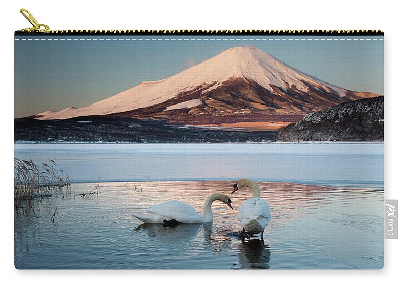 Vertebrate Zip Pouch featuring the photograph A Pair Of Mute Swans In Lake Kawaguchi by Mint Images - Art Wolfe