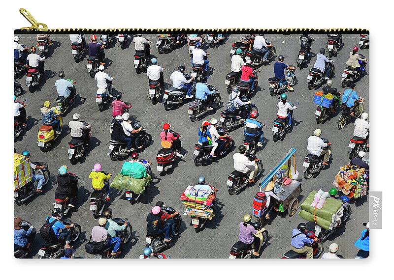 Ho Chi Minh City Zip Pouch featuring the photograph A Sea Of Mopeds During Rush Hour In by Rwp Uk