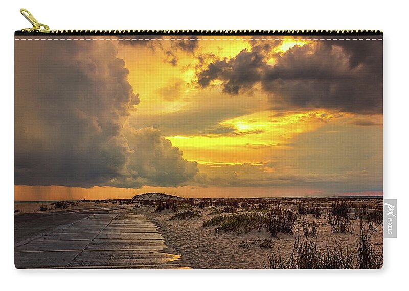 Storm Zip Pouch featuring the photograph A storm aglow by Mike Whalen
