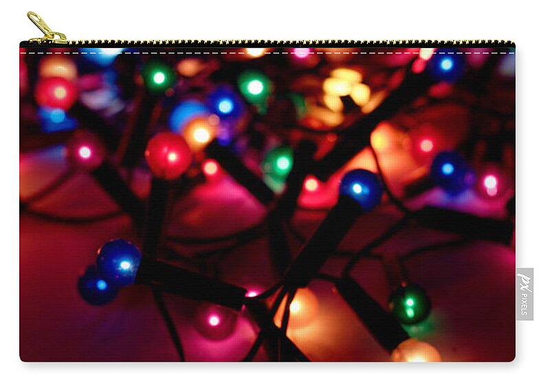 Holiday Zip Pouch featuring the photograph A String Of Christmas Lights Out For by Fizia