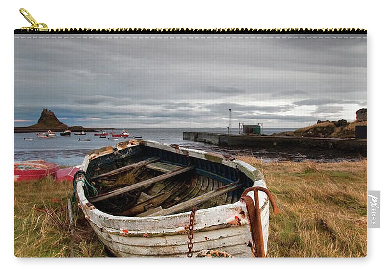 Scenics Zip Pouch featuring the photograph A Weathered Boat And Fishing Equipment by John Short / Design Pics