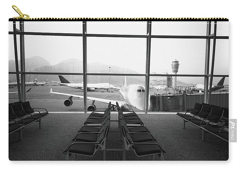 Airport Departure Area Zip Pouch featuring the photograph Airport Waiting Area B&w by Walter Bibikow