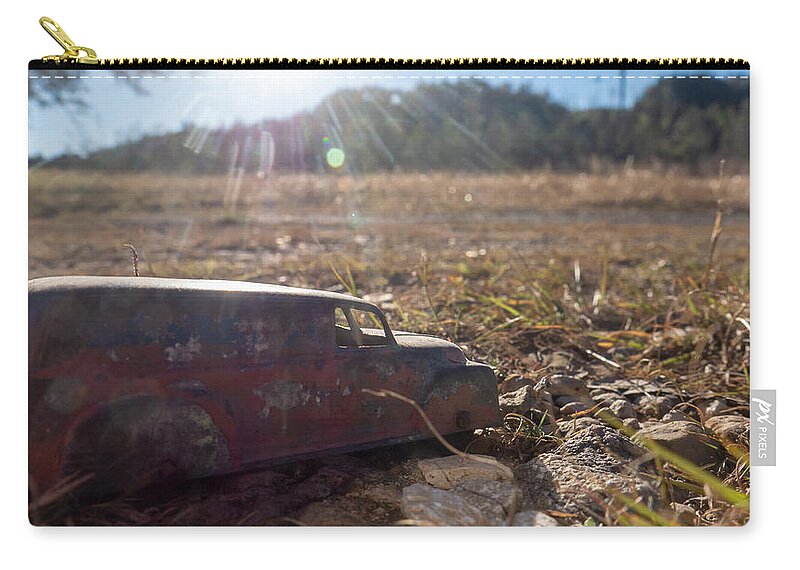 Car Zip Pouch featuring the photograph Apocalyptic Derelict by Ivars Vilums