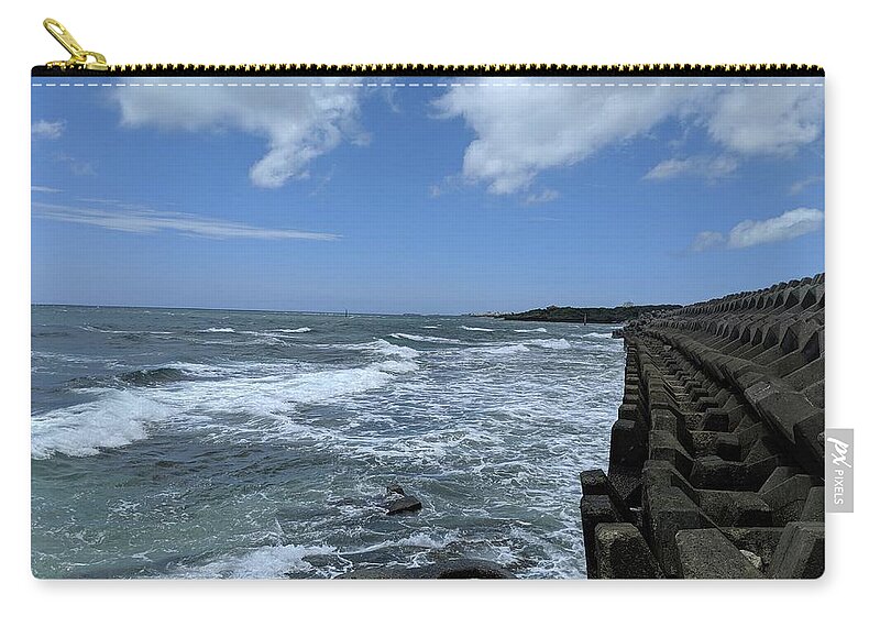 Okinawa Zip Pouch featuring the photograph At the seawall by Eric Hafner