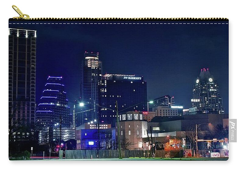 Austin Zip Pouch featuring the photograph Austin Unique Angle by Frozen in Time Fine Art Photography