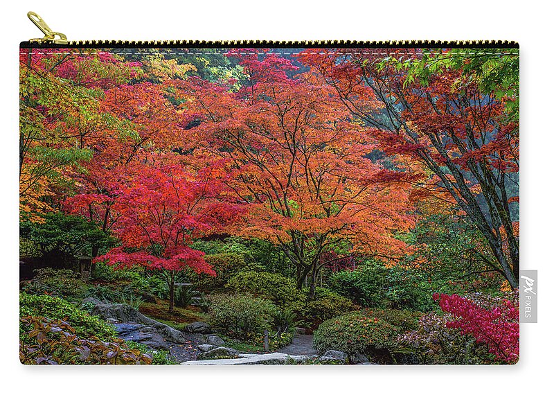 Autumn Zip Pouch featuring the photograph Autumn Magic by Emerita Wheeling