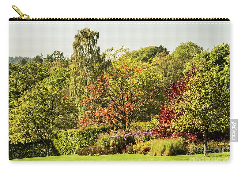 Autumnal Zip Pouch featuring the photograph Autumnal Trees by Sandra Cockayne ADPS