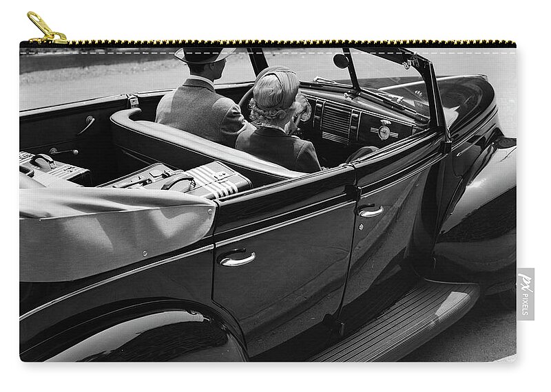 Heterosexual Couple Zip Pouch featuring the photograph Backview Of A Man Driving A Sedan by H. Armstrong Roberts