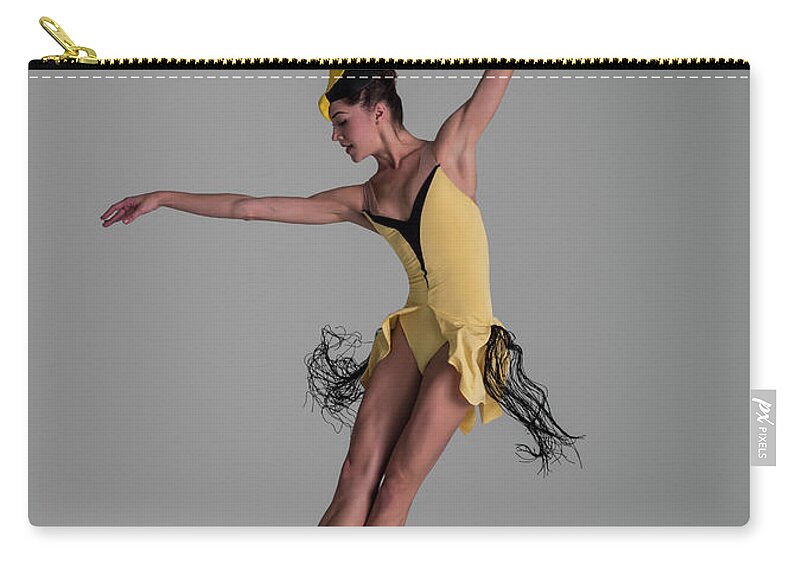 Ballet Dancer Zip Pouch featuring the photograph Ballerina Leaping With Yellow Bird by Nisian Hughes