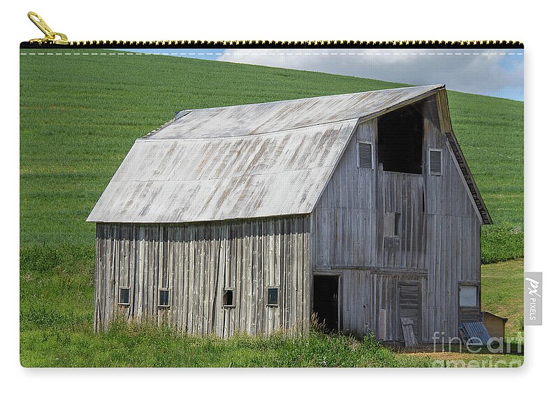 Abandoned Zip Pouch featuring the photograph Barely used Barn by Roger Patterson