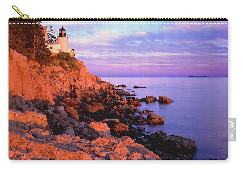 Water's Edge Zip Pouch featuring the photograph Bass Harbor Lighthouse Maine P by Ron thomas
