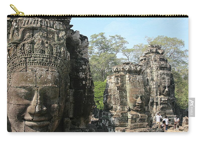 Disbelief Zip Pouch featuring the photograph Bayon Temple by Jjacob