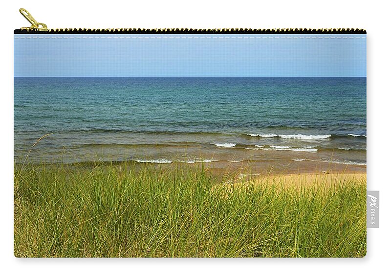 Beach Grass Zip Pouch featuring the photograph Beach grass by Tom Kelly