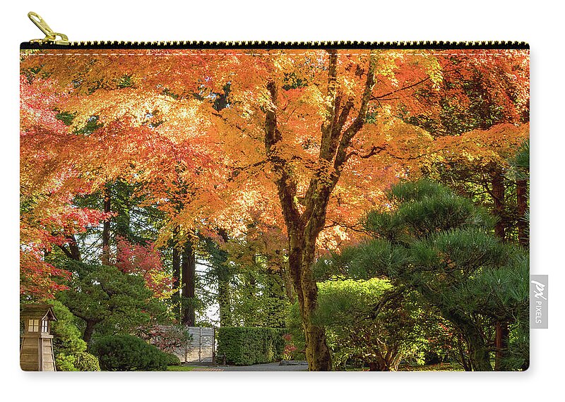 Garden Zip Pouch featuring the photograph Bench in Japanese Garden by Jean Noren