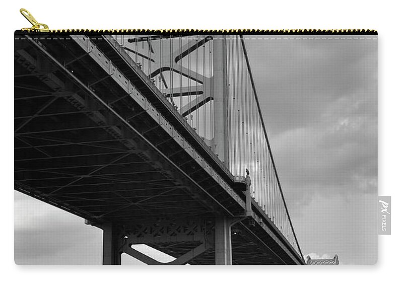 Built Structure Zip Pouch featuring the photograph Benjamin Franklin Bridge by Miguelmalo