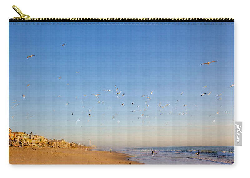 Carlsbad Village Beach Zip Pouch featuring the photograph 5 O'clock Bird Flight by Catherine Walters