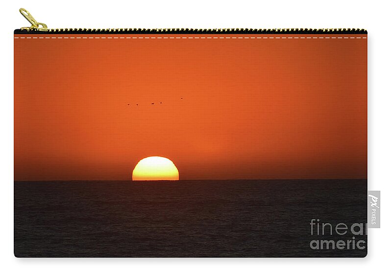 Sunset Zip Pouch featuring the photograph Birds Flying Over The Sunset by Aicy Karbstein