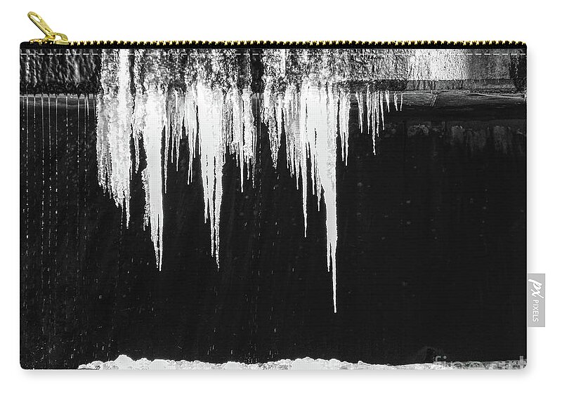 Black And White Zip Pouch featuring the photograph Black And White Icicles by Phil Perkins