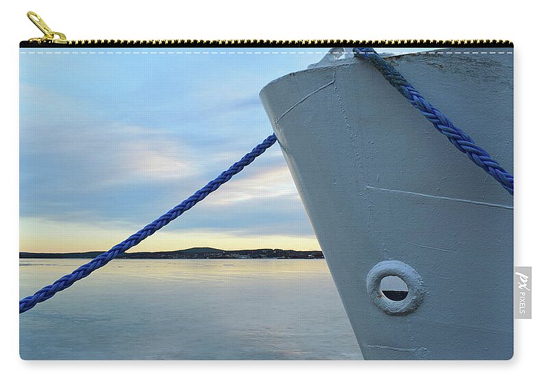 Bay Zip Pouch featuring the photograph Blue rope and ship's bow in an icy harbor by Intensivelight