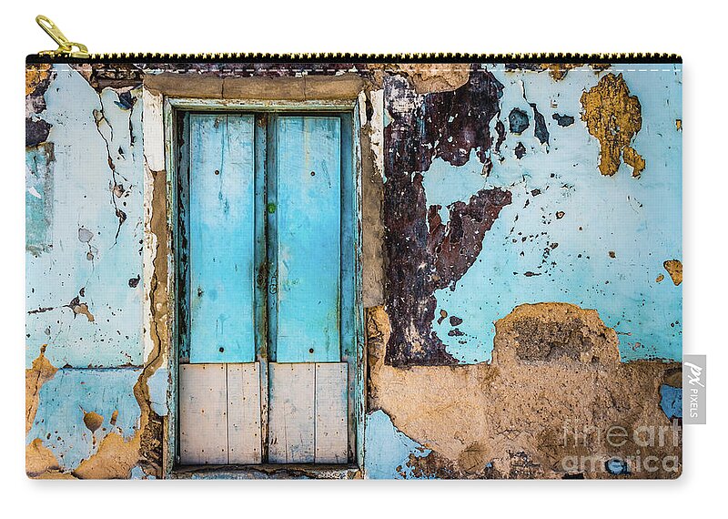 Wall Zip Pouch featuring the photograph Blue wall and door by Lyl Dil Creations