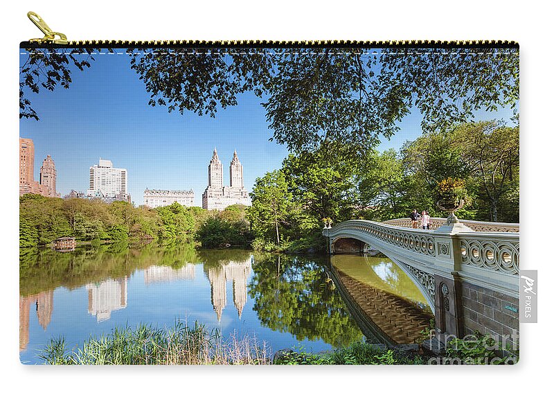 Central Park Zip Pouch featuring the photograph Bow bridge in springtime, Central Park, New York by Matteo Colombo